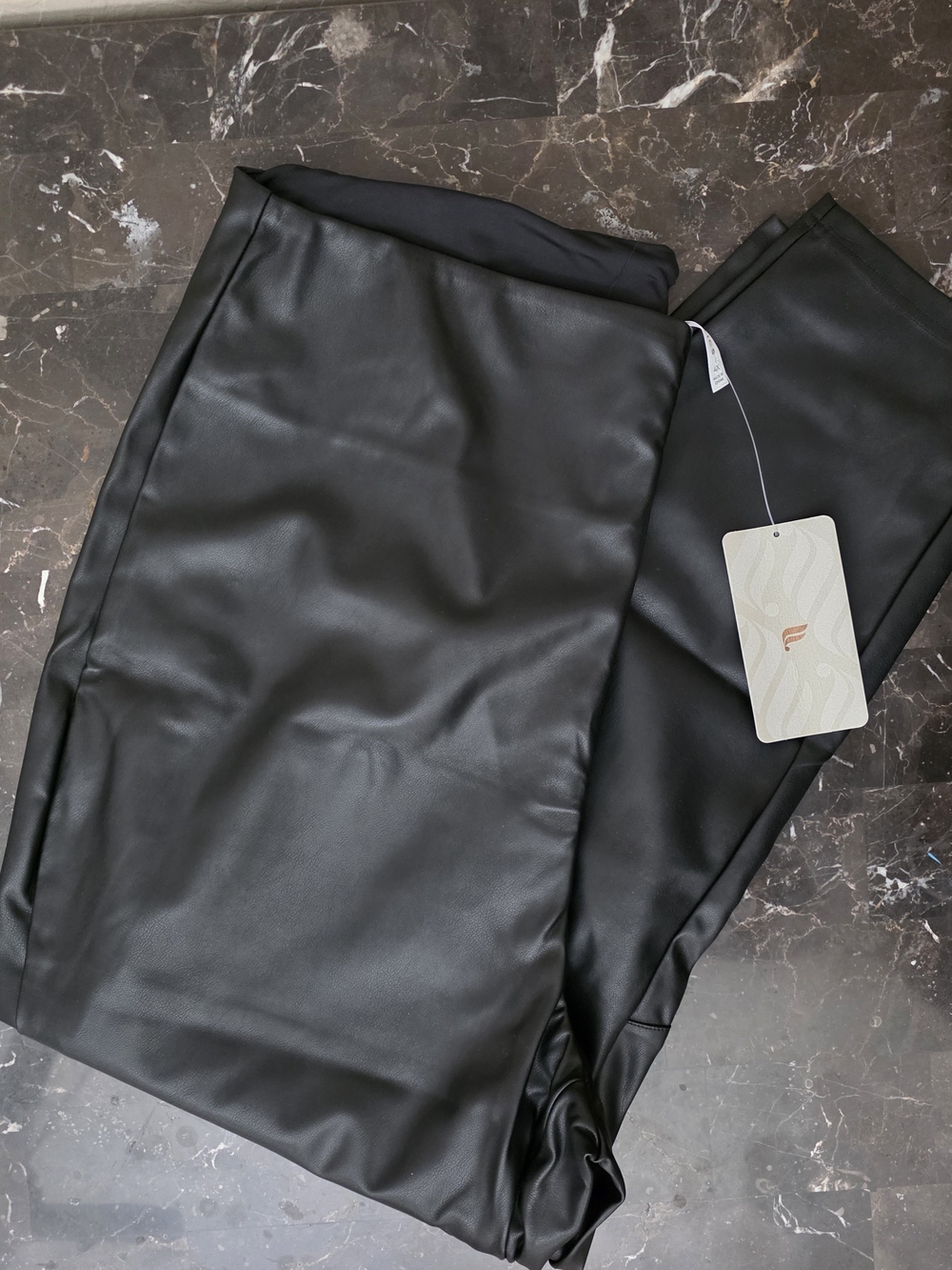 Black Faux Leather Leggings With A Side Zipper with Smooth Finish